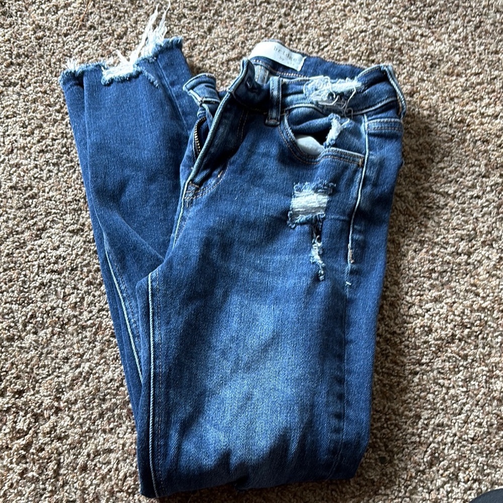 Blue Skinny Jeans with Distressed Details